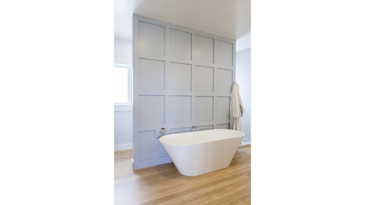 Protect wet areas with Resene MoulDefender, formulated into the Resene Kitchen & Bathroom range. This bathroom is finished in Resene Silver Chalice.
