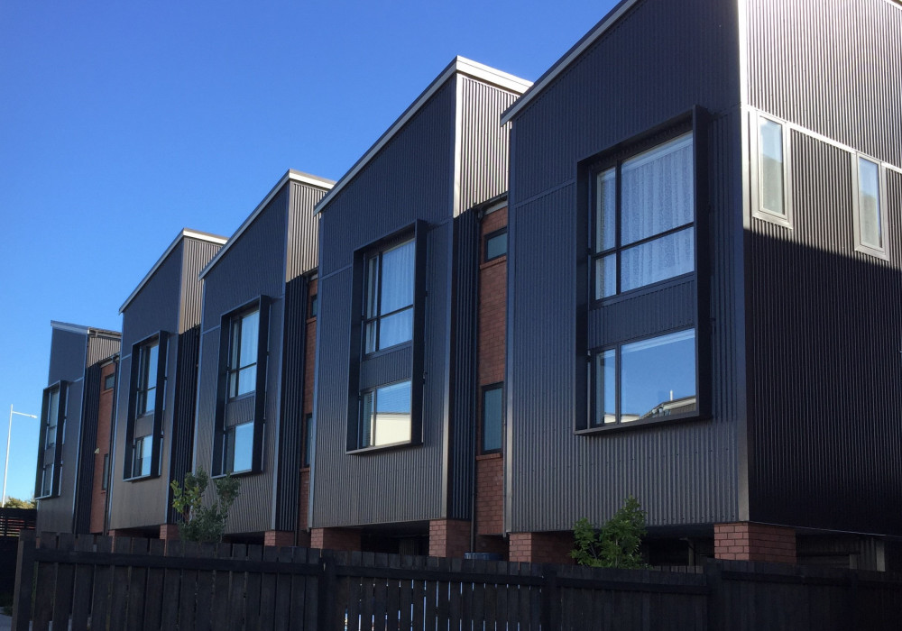 Frame Feature Windows with Spectrum Facade Shrouds