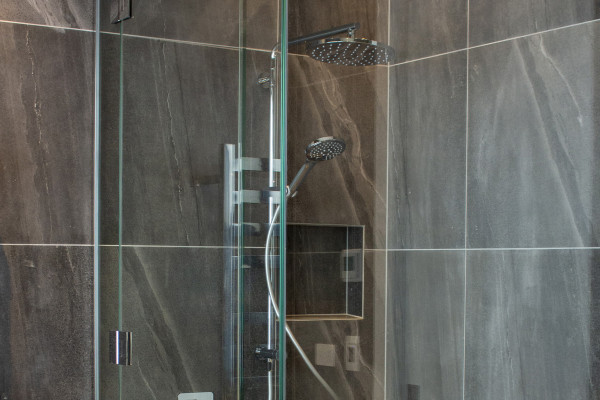 Designing with a Frameless Shower Door Can Help Make a Small Bathroom Bigger
