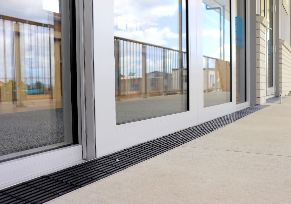 Level Threshold Access in Educational Facilities: Weathertightness Design Requirements
