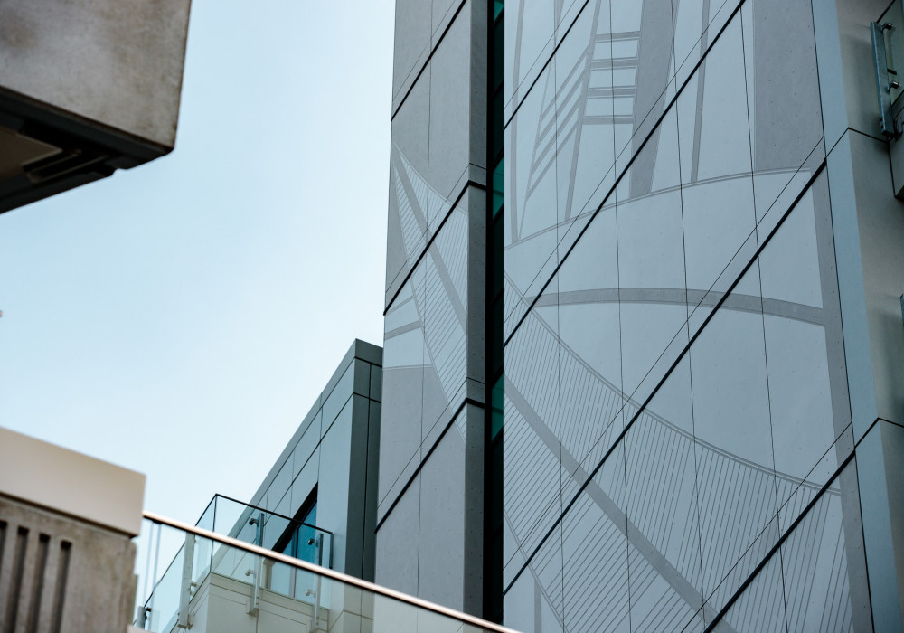 Bespoke Engraved Cladding Enhances Auckland Apartment Development