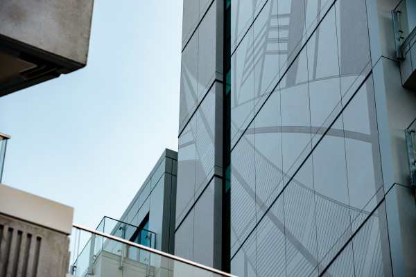 Bespoke Engraved Cladding Enhances Auckland Apartment Development