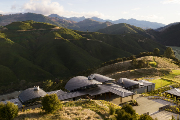 Dynamic Curved Metal Roofs Feature at Falcon Brae Villa