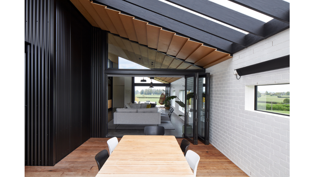 Bi-fold doors with a custom window above adds more interest.