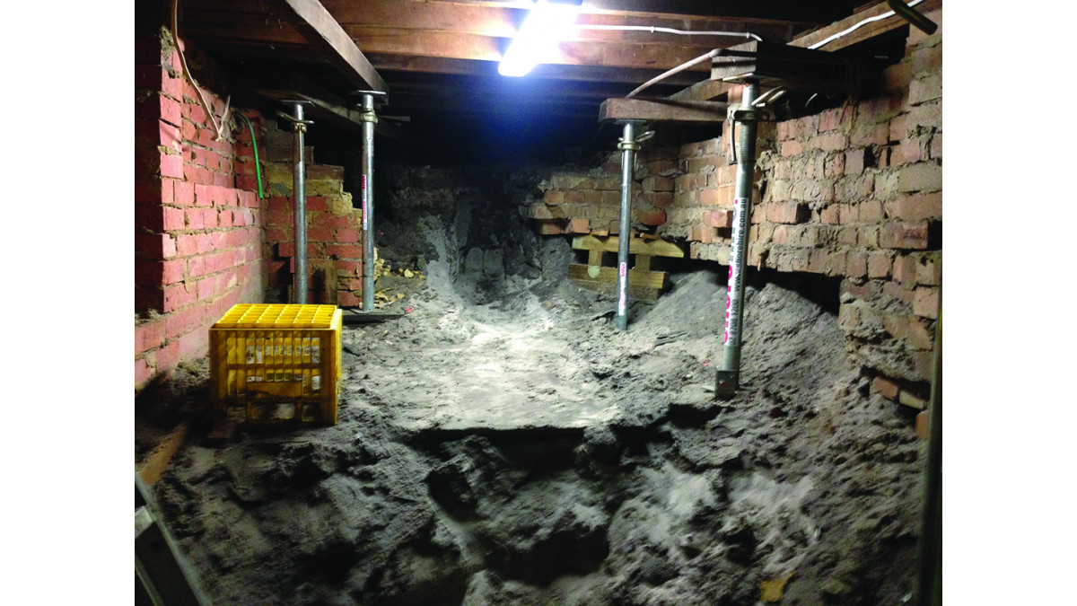 Before the renovation: An unused, undeveloped basement. 
