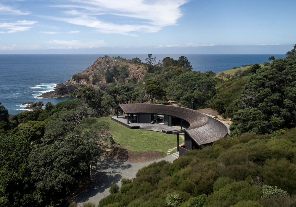 Open Spaces and Sliding Doors Characterise This Unique Coastal Build