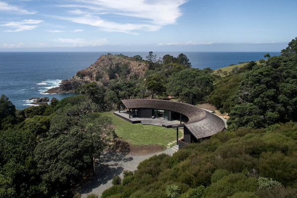 Open Spaces and Sliding Doors Characterise This Unique Coastal Build