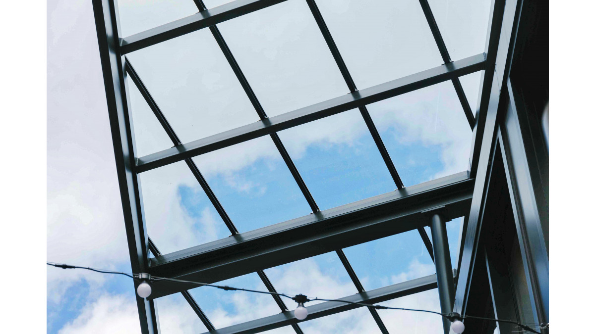 The glazed pedestrian canopy measured 25m long by 3.7m wide