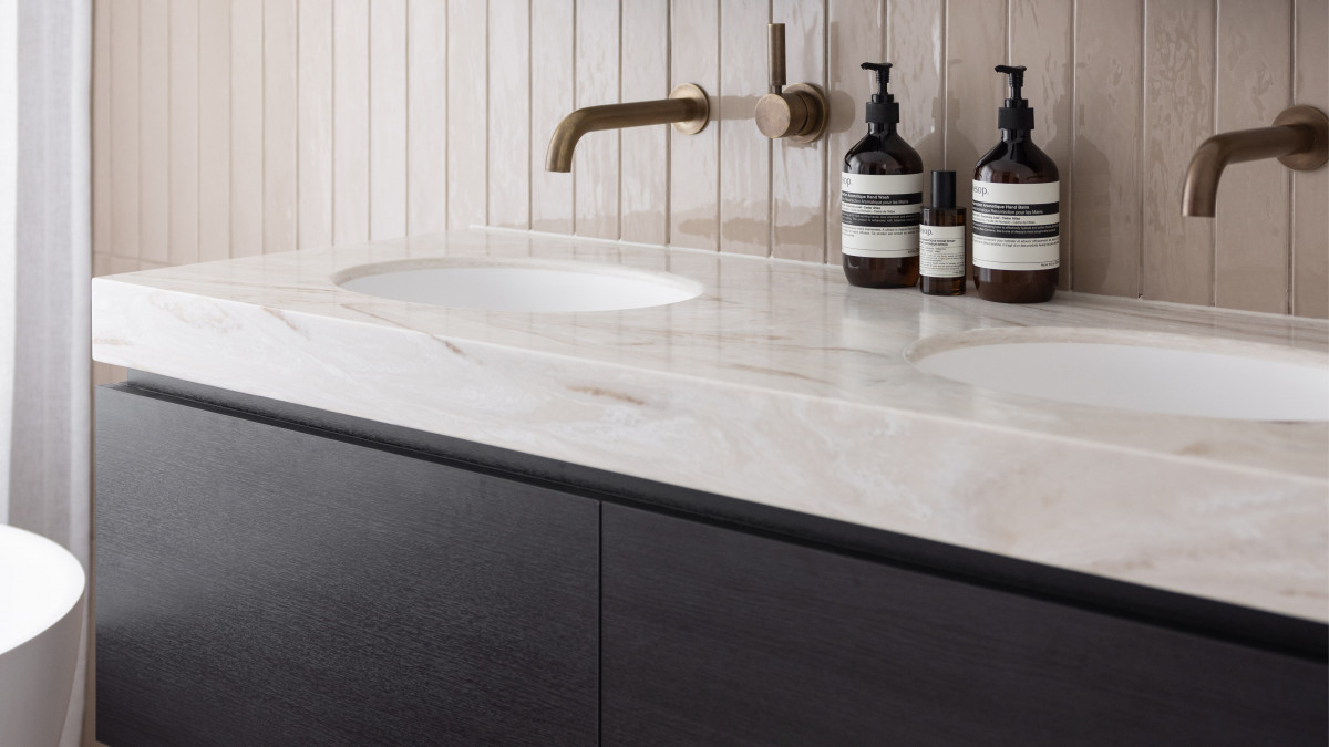 Corian Dune Prima vanity top with integrated PURE Corin 810 basins in Glacier White. <br />
Design: Georgia Langridge and Fleur Jourdain, Modi Design. <br />
Fabrication: O'Brien Group Christchurch. <br />
Photography: Hazel Redwood Photography.