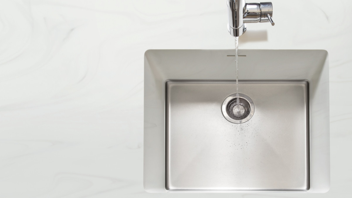 Corian Valente Grigio benchtop with an integrated EOS DUO024 in Valente Grigio sink.