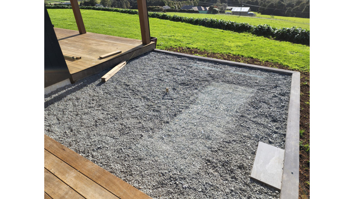 Dry laid onto gravel.