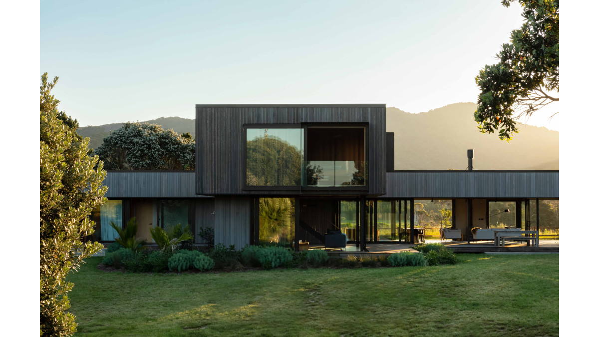 This award-winning house on Aotea Great Barrier Island featured 29 sliding door panels in various parts of the home.