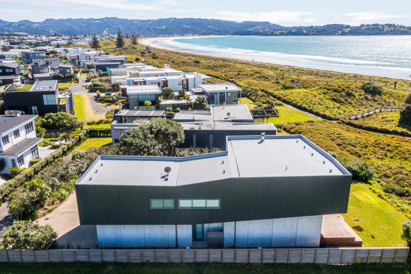 Heat Welded Membrane Roof Offers Trusted Durability for Coastal Home