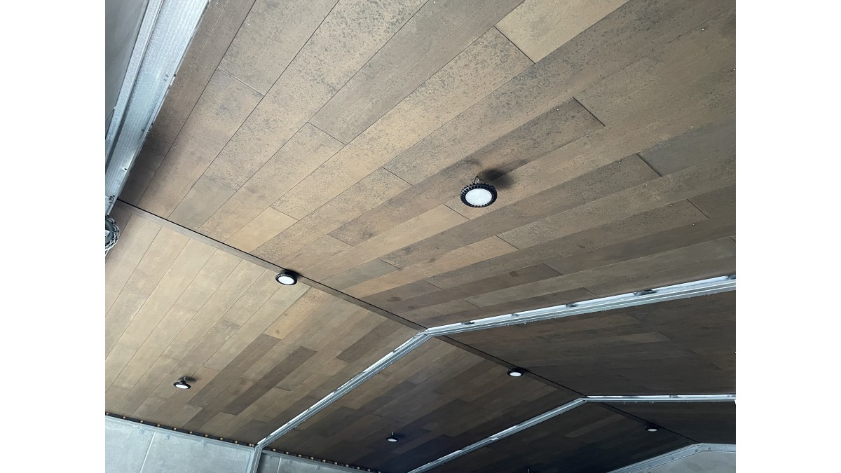 This shed ceiling Triboard TGV lining was stained with WOCA oils, giving it a leather look.