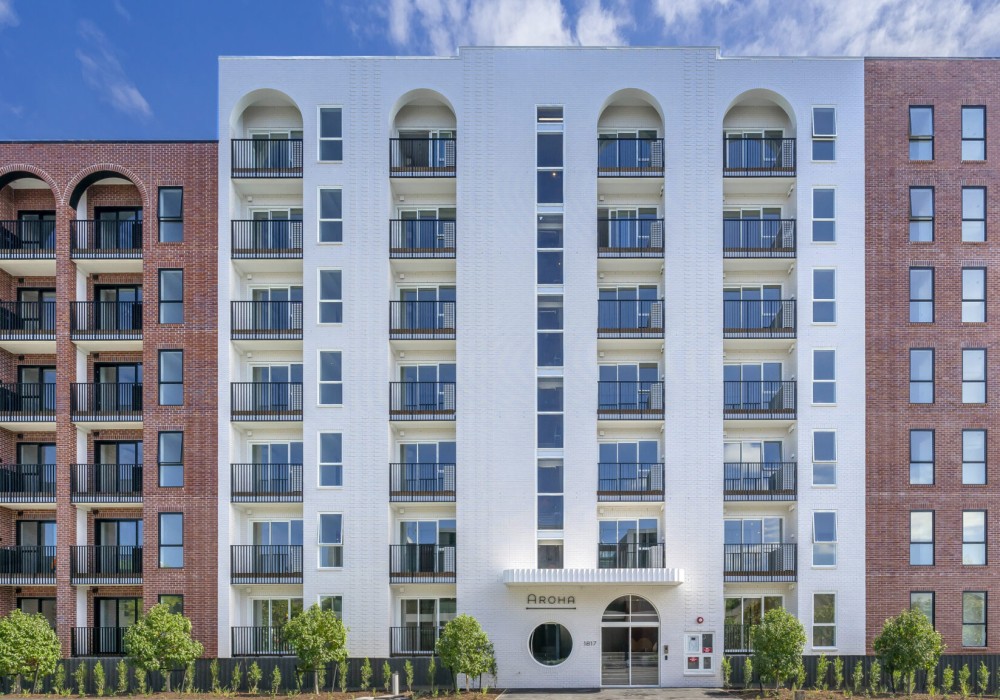 Aroha Development Enhanced with Premium UNEX Hampton Aluminium-Framed Balustrades