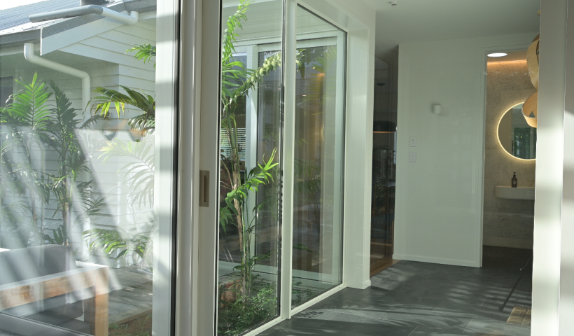 Soft-close Cavity Slider Connects New and Old in Kohimarama Home