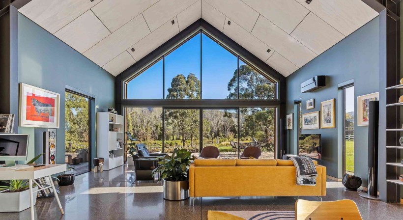 PlyPlay Lines a Soaring, Double-Height Interior