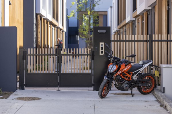 Combining Cedar and Aluminium for Stylish Custom Gates at The Paddington