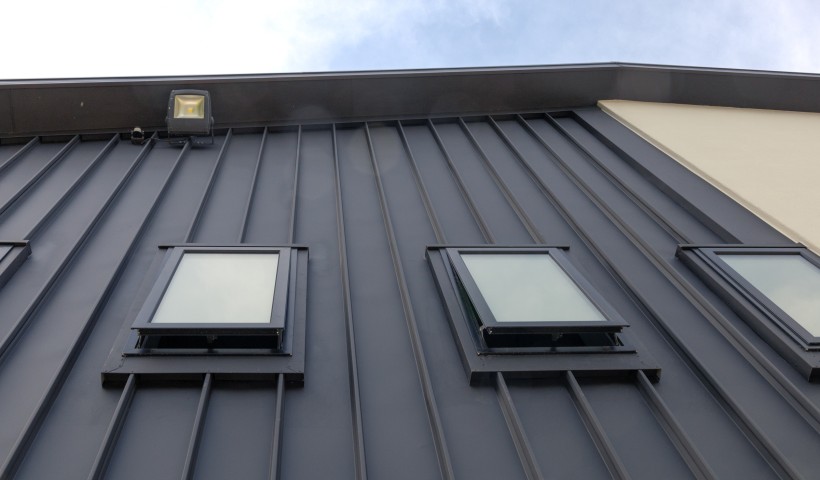 A Modern Cladding Profile for Historic Sports Club Refurbishment