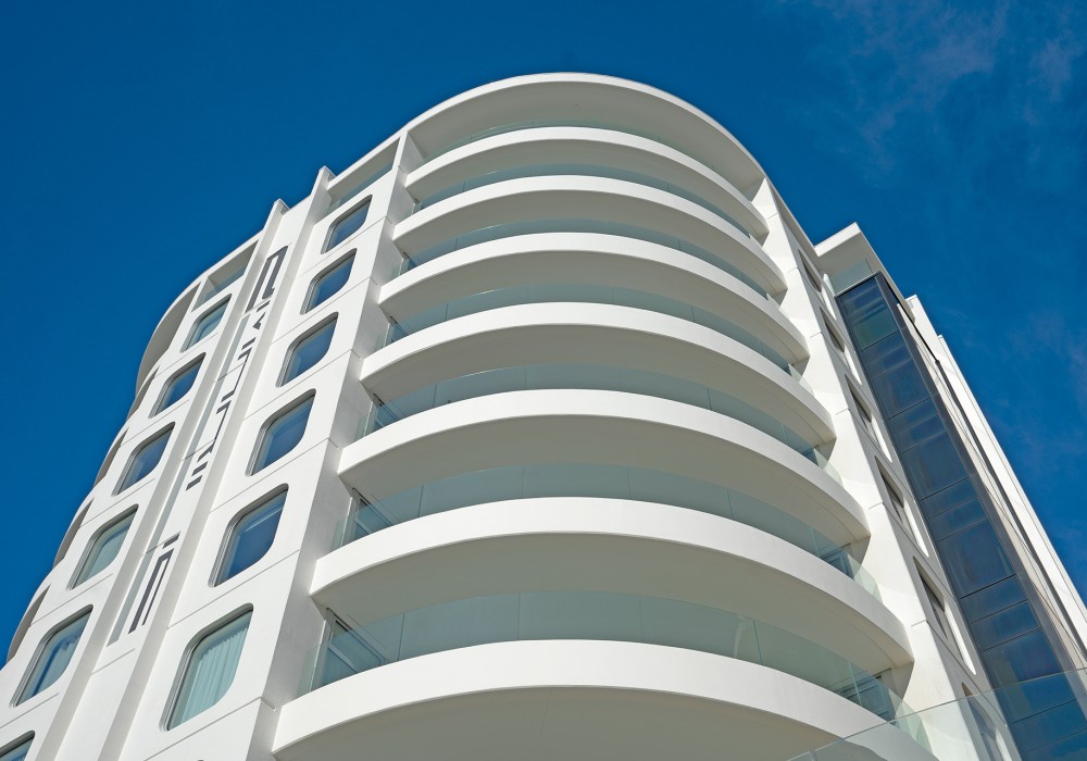 Achieving Curved Glass Balustrades for Oceanside Tower