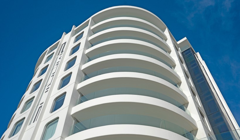 Achieving Curved Glass Balustrades for Oceanside Tower