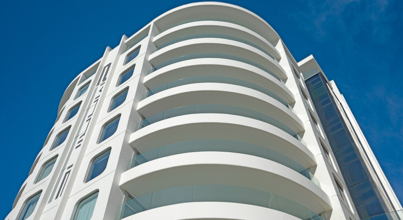 Achieving Curved Glass Balustrades for Oceanside Tower