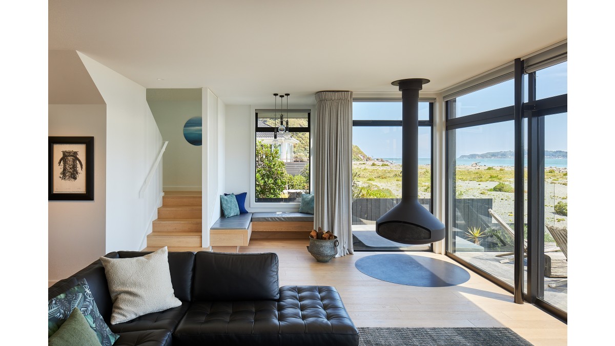 The living area opens up to the 180-degree viewframe of Mākaro Island.