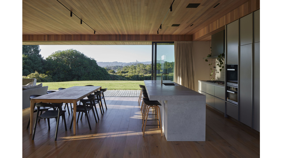 Flush sill sliding doors provide a seamless transition between indoor and outdoor.