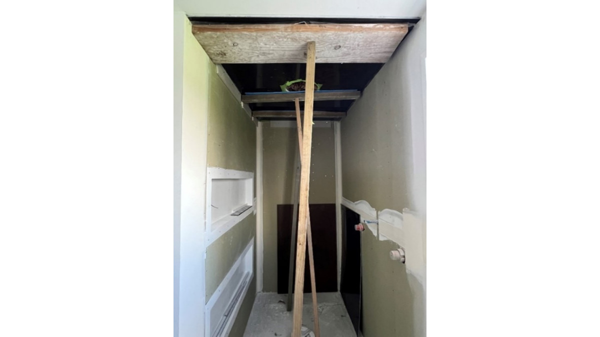 Framed shower enclosure lined with GIB Aqualine Shower walls with tiled finish.
