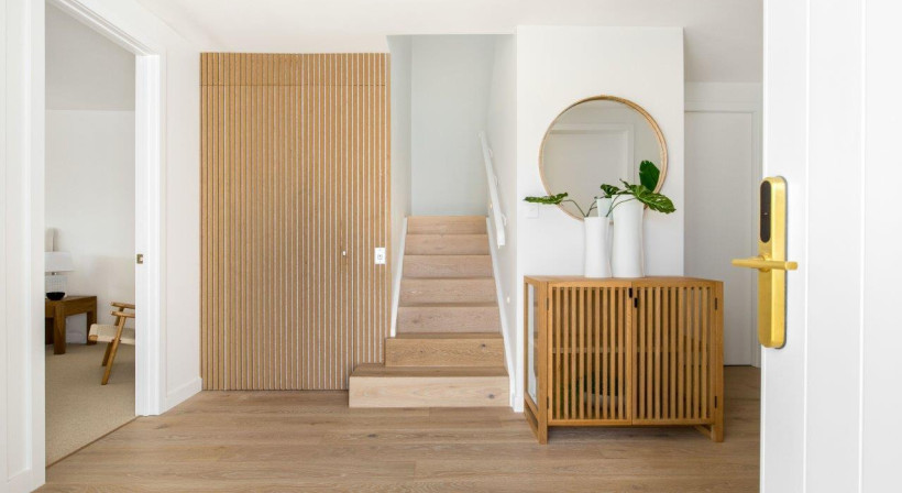 Clever Use of Vertical Wooden Slats Turns Affordable Powerglide Elevator into a Design Feature