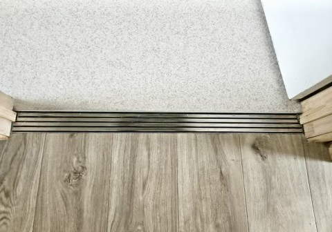 Innovative Drainage Solutions: Transforming Intertenancy Floor Protection with Jesani Door Channels