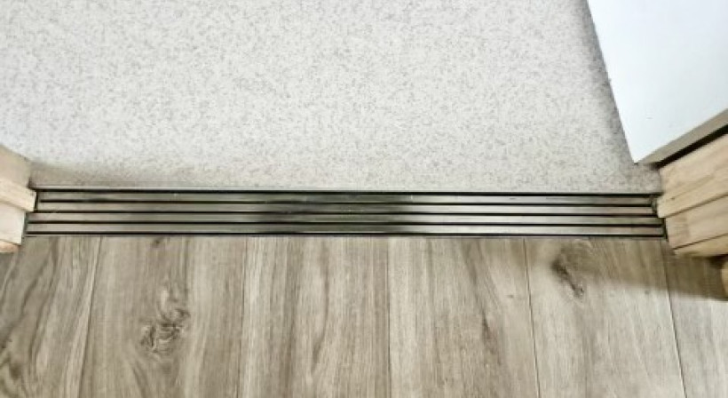 Innovative Drainage Solutions: Transforming Intertenancy Floor Protection with Jesani Door Channels