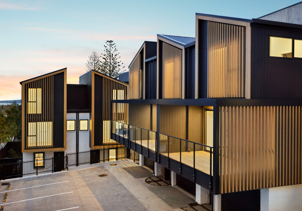 Woodgrain Coated Aluminium Louvres Keep Maintenance to a Minimum for 10-Home Development