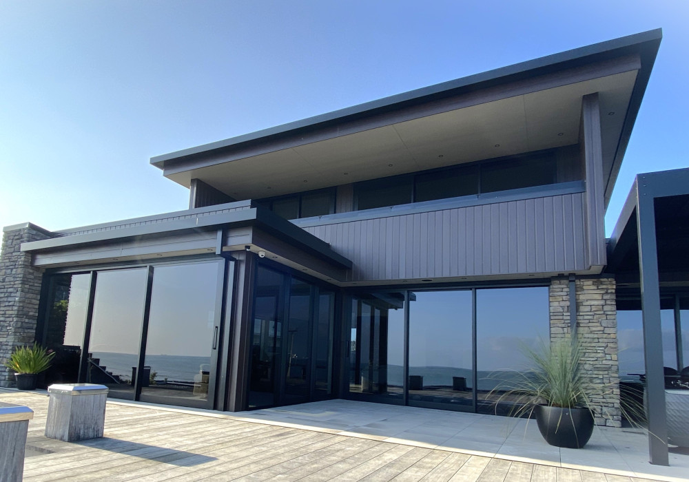 Coastal Home Features Aluminium Cladding with a Low Maintenance Woodgrain Finish