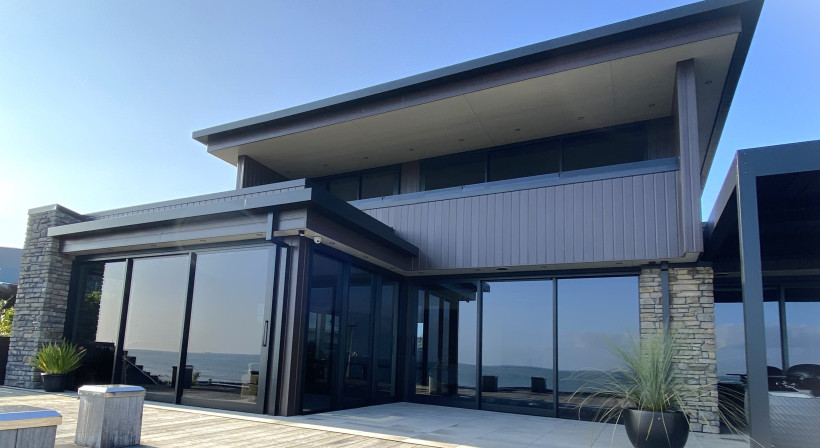 Coastal Home Features Aluminium Cladding with a Low Maintenance Woodgrain Finish
