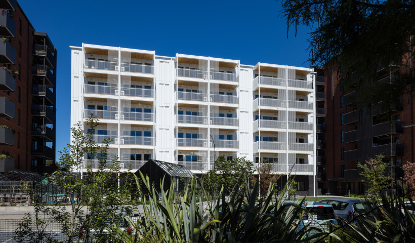 Non-Combustible, Low Maintenance Vertical Cladding for a Social Housing Development