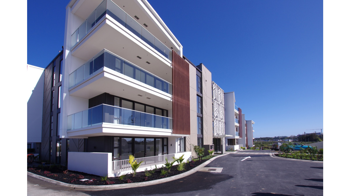The Botanic apartment building features vertical louvres, pureview glass ballustrates and seamless fin ballustrades.