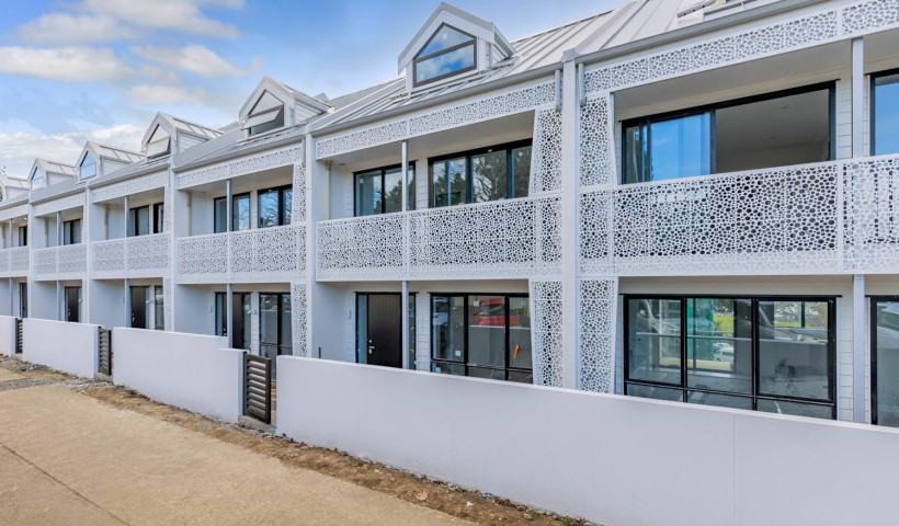 Slim Intertenancy Walls Provide Acoustic Control and Space Savings for Townhouse Development