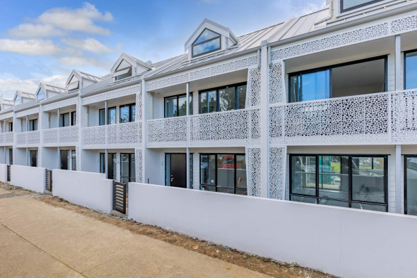 Slim Intertenancy Walls Provide Acoustic Control and Space Savings for Townhouse Development