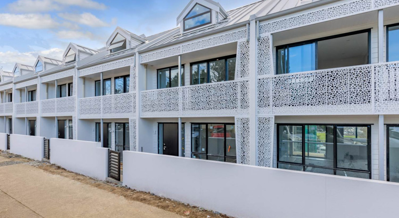 Slim Intertenancy Walls Provide Acoustic Control and Space Savings for Townhouse Development