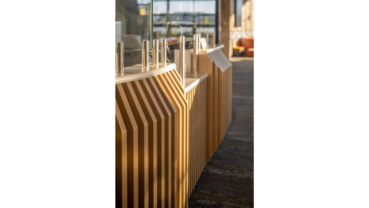 Melteca Aged Ash reception desk and HIMACS Carona benchtop.