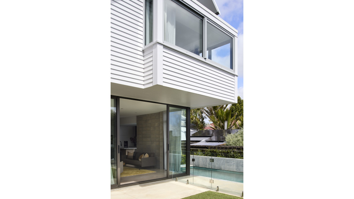 Sliding doors open up to the outdoor space.