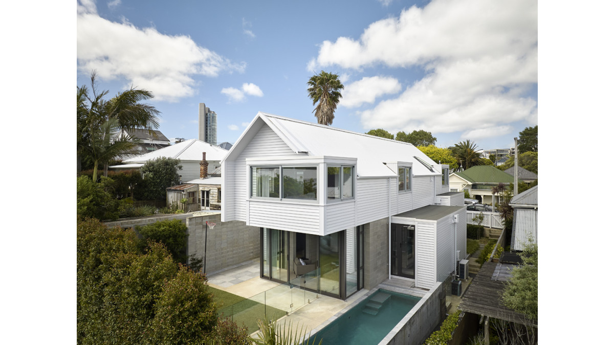 Gerrad Hall designed a home that would respond to the surrounding villas.