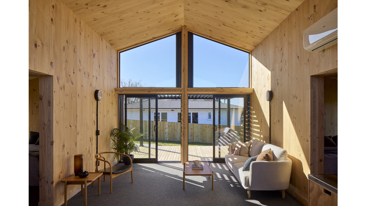 High ceilings make the living feel spacious.