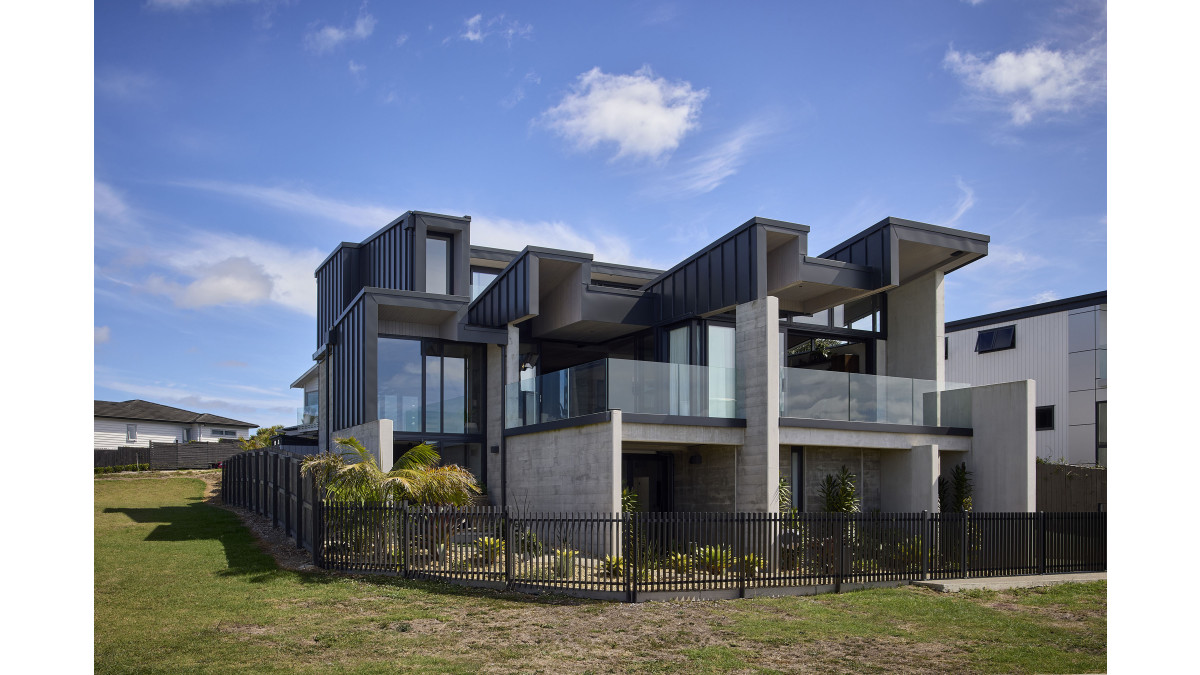 Designed to face Auckland's Sky Tower, from the Te Atatu Peninsula.