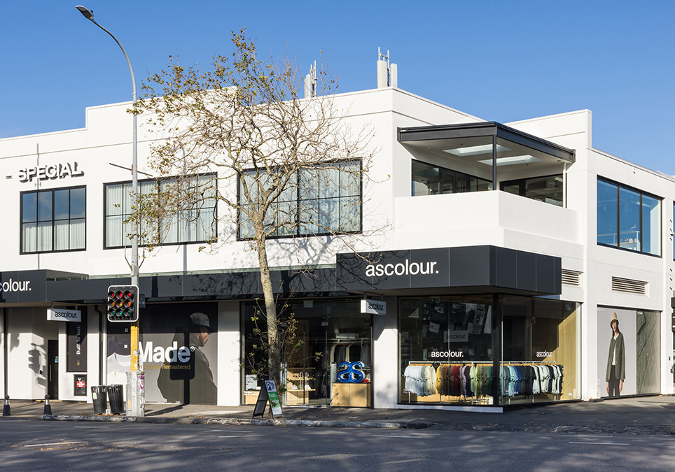 Rejuvenating a 1980s Commercial Building with a Façade Redesign and Refined Plaster Finish