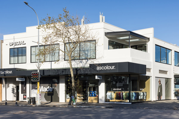 Rejuvenating a 1980s Commercial Building with a Façade Redesign and Refined Plaster Finish