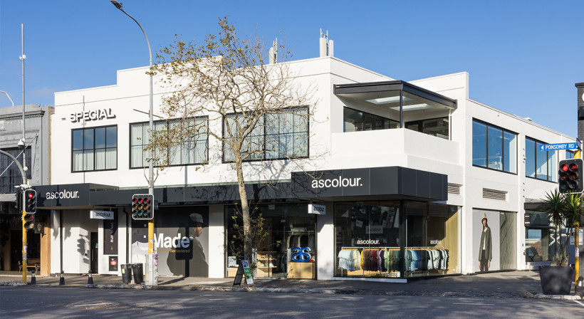Rejuvenating a 1980s Commercial Building with a Façade Redesign and Refined Plaster Finish