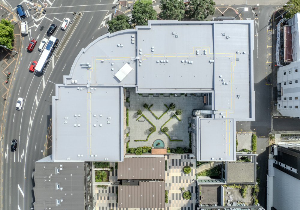 A Roof Refurbishment with Minimal Disruption? Overlaying a 2100m² Leaky Apartment Roof with the Viking Warm Roof System