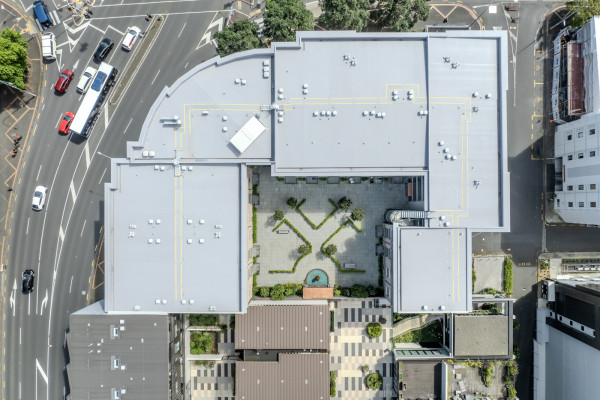 A Roof Refurbishment with Minimal Disruption? Overlaying a 2100m² Leaky Apartment Roof with the Viking Warm Roof System